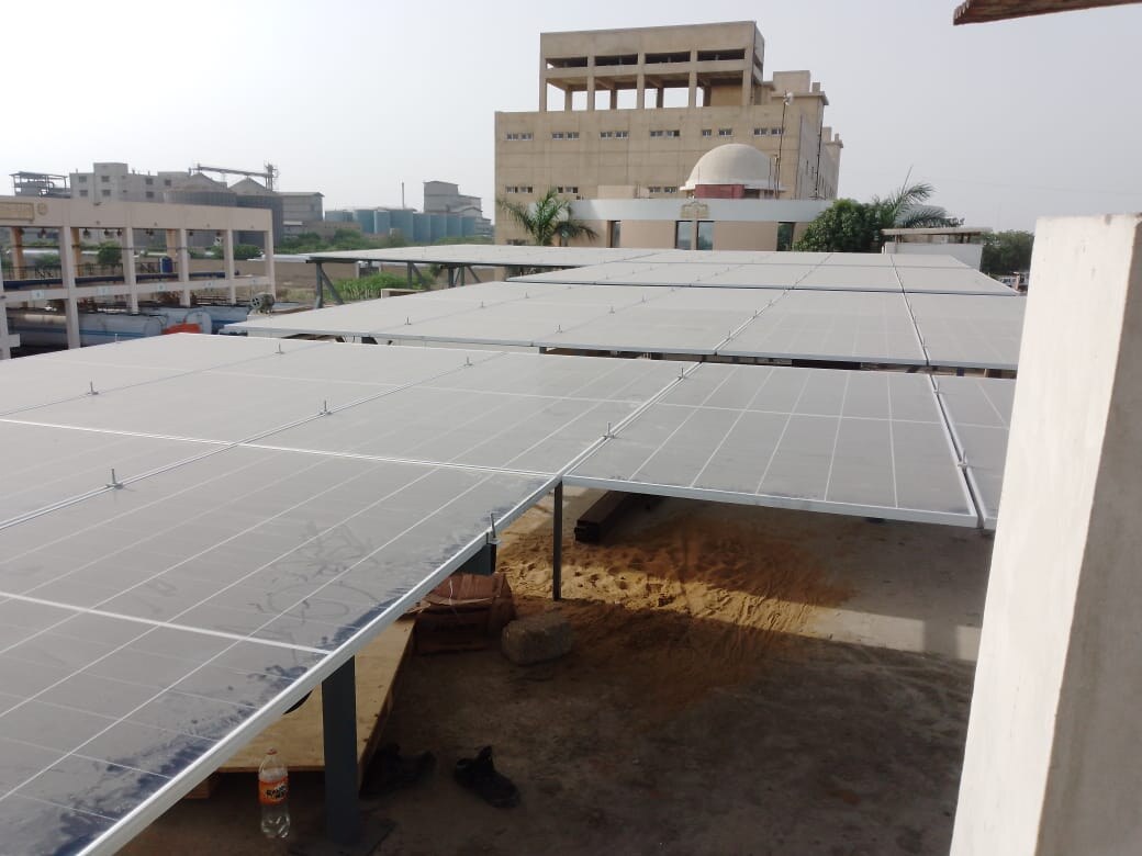 Solar panels arranged across a rooftop
