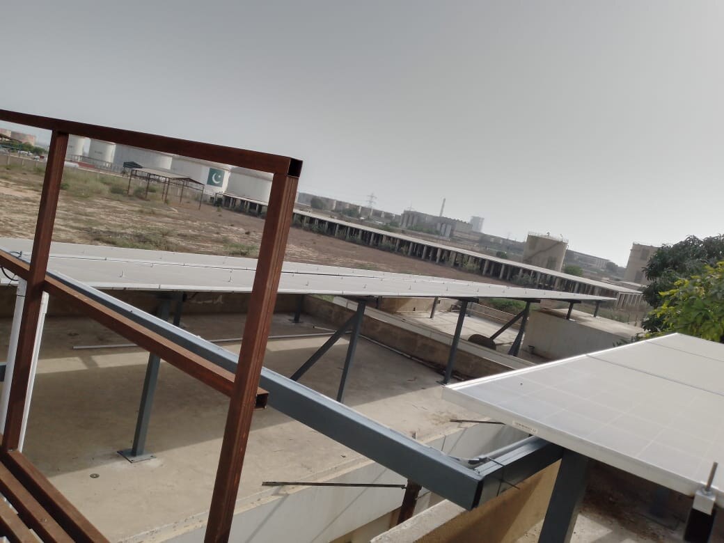 Rooftop support structure and solar panels